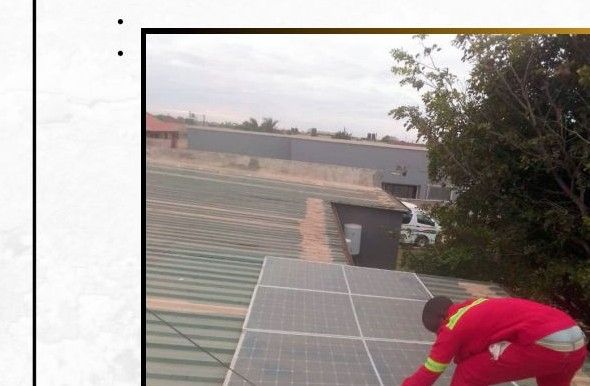 Solar panels installed on a rooftop in Lusaka by Rayema Enterprise